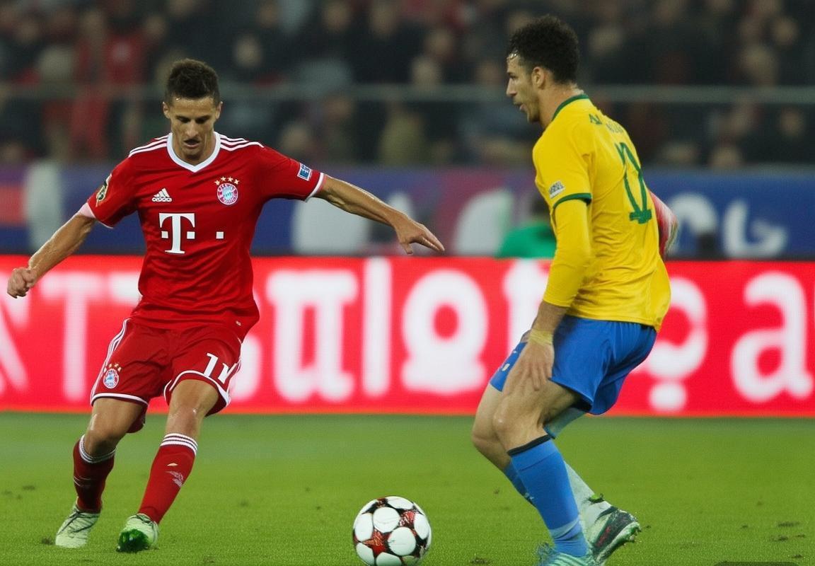 拜仁慕尼黑VS库蒂尼奥：巅峰对决战术解析与个人风采